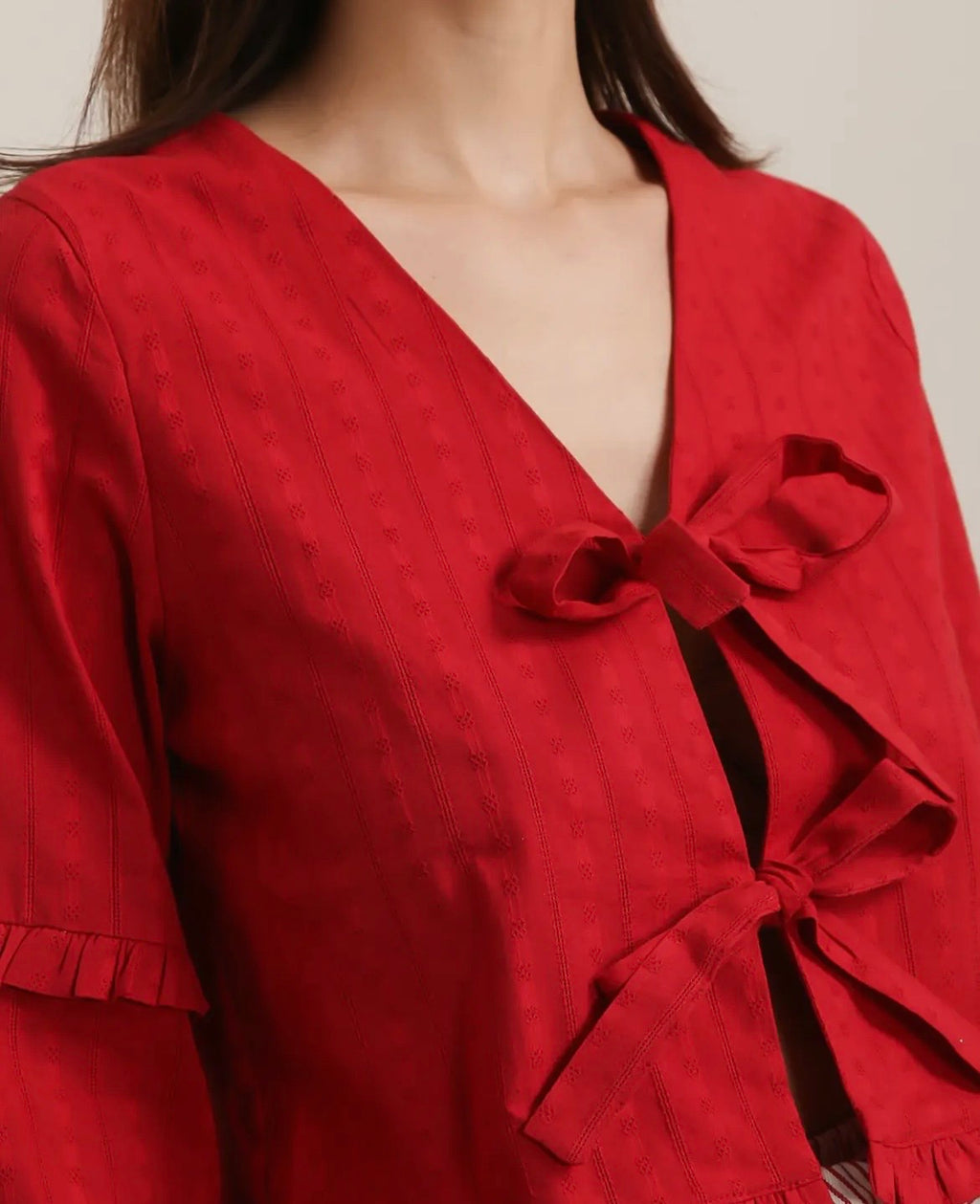 Blusa nudos rojos