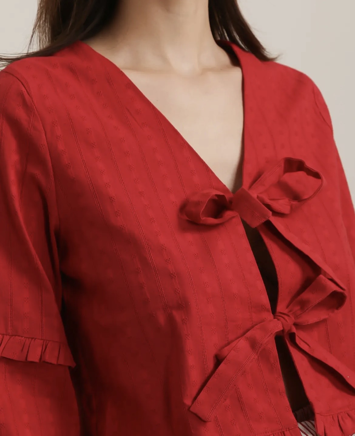 Blusa nudos rojos